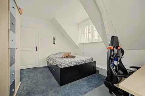 Slaapkamer 3 gezien vanaf het bureau